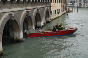 Travel Plans Don't Always Include Emergencies / Venetian Fire Boat - (c) 2006 Ted Grellner