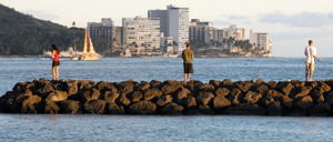 No matter where you travel to, there is bound to be fishing / Fishing in Waikiki - (c) 2007 Ted Grellner