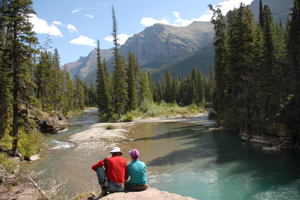Plan a hike when you travel / Resting from a hike in Glacier N.P. - (c) 2006 Ted Grellner